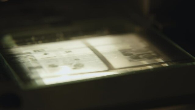 Microfilm machine library archive investigation