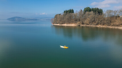 Kayak on the lake. Tourist kayaking. Aerial Photo drone.