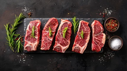 Abwaschbare Fototapete Raw marbled beef tenderloin steaks © AlfaSmart