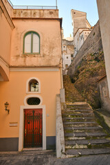 Fototapeta na wymiar A characteristic narrow street in the villages of the Amalfi coast in Italy.