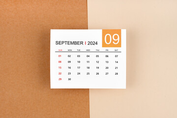 A September 2024 calendar page on yellow.