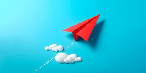 A red paper plane isolated on a blue background, banner with space for text