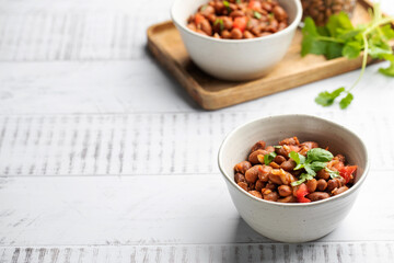  Vegetarian dish of stewed pink beans and tomatoes. A delicious bean dish served 