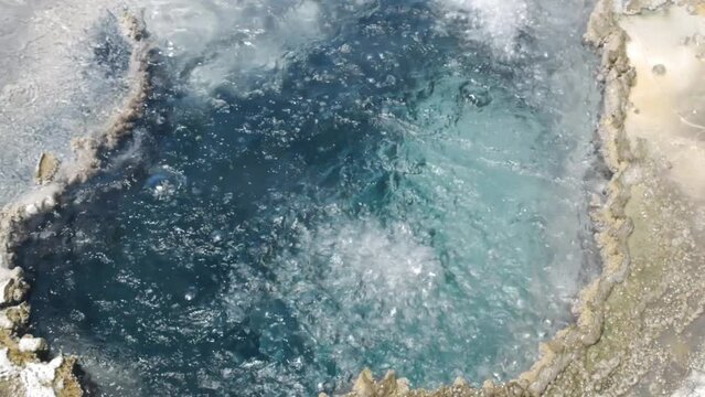 Beautiful landscape of volcano geyser at Yellowstone National park, 4K aerial footage. 