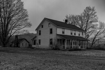 Abandoned farmhouse house in the Delaware Water Gap National Recreation Area in black and white