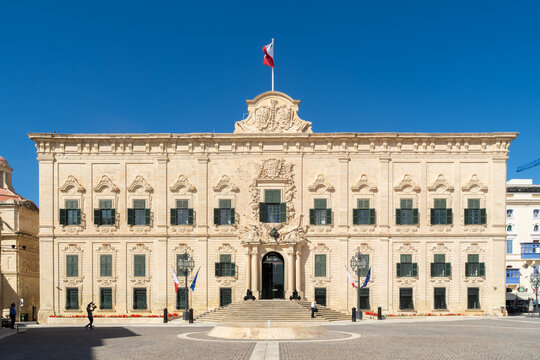 Valletta, Malta - June 1st 2020: The Maltese flag flying over the Auberge de Castille built in the 1740&rsquo;s which has been used as the Office of the Prime Minister of Malta since 1972.