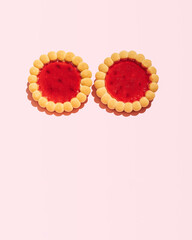 Two cookies with fruit filling as sunglasses, summer beach party, vacation, holidays, minimal creative concept.
