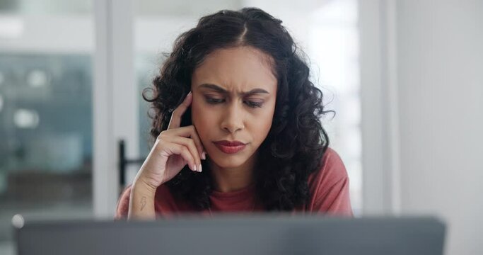 Serious, woman or laptop to search, writing or proposal for business, startup or project management. Thinking, female entrepreneur and computer monitor for reading, typing and information in office