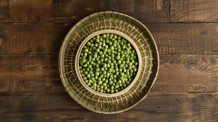 Lot of whole canned pea on round bamboo coaster flatlay on brown wood