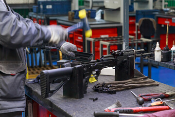 Processing line of assembling assault rifle.