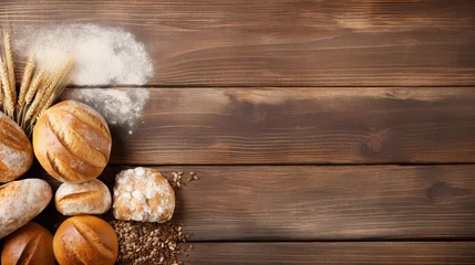  Assorted freshly baked bread on wooden backdrop, top view with ample space for text placement © Aliaksandra