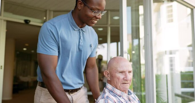 Nursing home, wheelchair and black man with old patient, person with a disability and rehabilitation. Recovery, elderly guy and pensioner with volunteer or healing with healthcare, support and help
