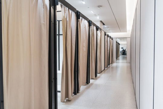 Booth fitting rooms clothing shop.
