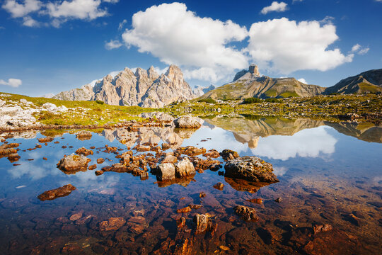 Perfect view of the sunny Lago Rienza - Ursprung in Tre Cime di Lavaredo. Sexten Dolomiti, South Tyrol, Europe.
