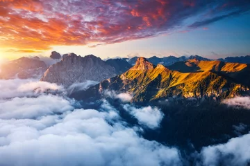 Fototapete A magical drone view of the Val di Fassa valley. Italian Alps, Dolomites, South Tyrol, Europe. © Leonid Tit