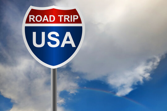 Red and blue road sign with USA road trip word