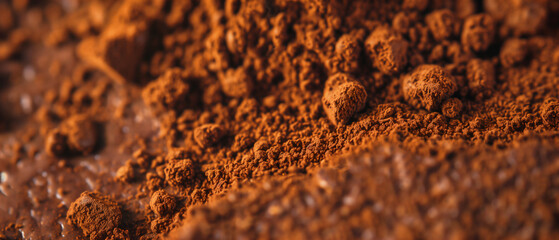 Extreme close up texture of grounded coffee beans in detail