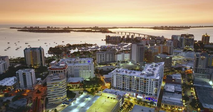 Sarasota city, Florida with waterfront office high-rise buildings and John Ringling Causeway. Development of housing and transportation in the US