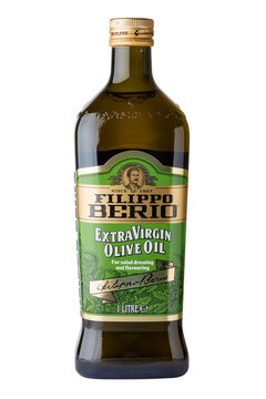 Glass bottle of  Extra Virgin Olive Oil Filippo Berio is a brand of olive oils exported from Italy and made of oil from Italy, Greece, Spain and Tunisia. isolated object. Illustrative editorial