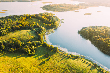 Braslaw Or Braslau, Vitebsk Voblast, Belarus. Aerial View Of Nedrava Lake, Green Forest And Meadow Landscape In Sunny Autumn Morning. Top View Of Beautiful European Nature From High Attitude. Bird's - 760566529