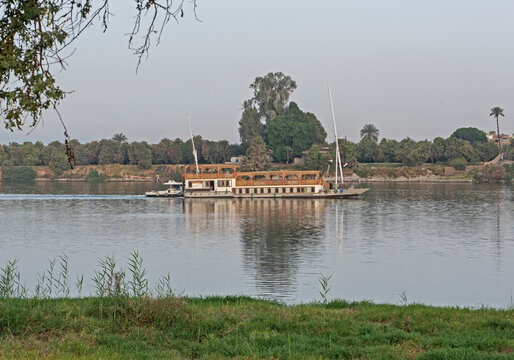 Large egyptian river cruise dahabeya boat sailing on Nile