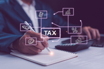 Businessperson calculating taxes with holographic charts, focused on finance and taxation management. Financial research, government taxes and calculation tax return concept. - obrazy, fototapety, plakaty
