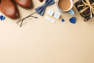 Defining fatherly Elegance: father's day selection. Top view shot of brown shoes, blue tie,...