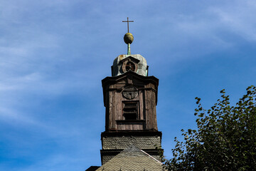 A four-sided turret with dormers on the roof of the church