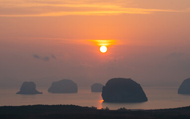 .Imagine a beautiful bright yellow sky at sunrise..stunning view of the beautiful Phang Nga Bay....