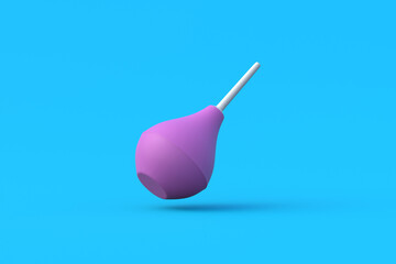 Falling enema on blue background. Rubber douching bag. Pear shaped syringe bulb. Medical clyster. Nasal aspirator. Laboratory tool. Constipation treatment. 3d render
