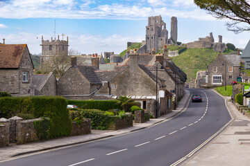 Sweeping view of Corfe village and the ruins of its prominent castle