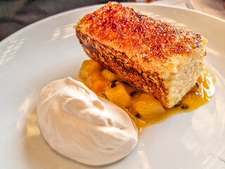 Typical Brazilian pudding served with fruits and ice cream