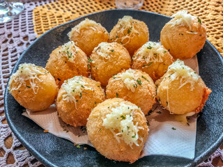 Typical Brazilian fried cheese balls - 760621728