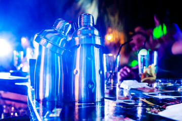 Shakers in a nightclub for preparing alcoholic and non-alcoholic cocktails in bars - 760624727