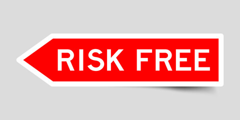 Red color arrow shape sticker label with word risk free on gray background
