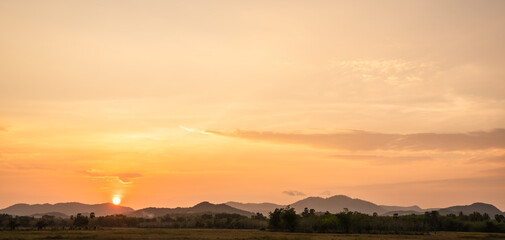 Fototapeta premium sunset over the countryside landscape