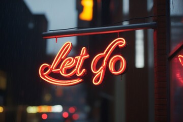 Slogan let go neon light sign text effect on a rainy night street, horizontal composition - obrazy, fototapety, plakaty