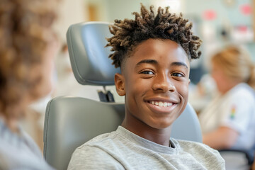 Young patient in doctor's office, African American teen boy, healthcare visit, medical examination.