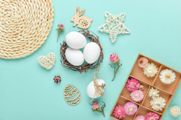 Easter composition, eggs, dried flowers and eco decorations for decorating Easter eggs. Flat lay. copy space