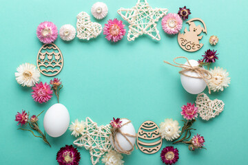 Easter frame, eggs, dried flowers and eco decorations for Easter egg decoration. Easter eggs. Flat...