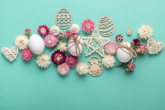 Easter composition, eggs, dried flowers and eco decorations for decorating Easter eggs. Flat lay. copy space