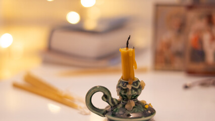 church candle close up bokeh, prayer and lent concept
