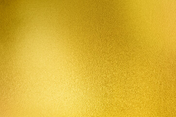 Luxury gold gradient light shiny glitter texture background. Golden shiny foil gradient metallic...