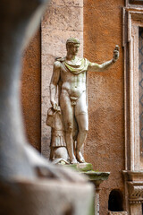 Ancient Roman statue in the courtyard of Palazzo Mattei di Giove in Rome male figure of emperor