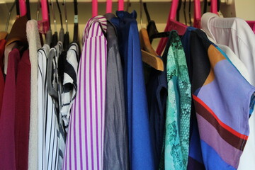 colorful clothes on hangers