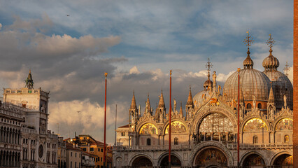 Saint Mark Square famous landmarks in Venice at sunset - obrazy, fototapety, plakaty