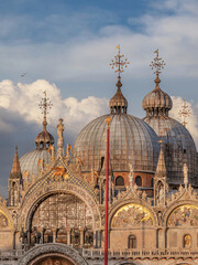 Saint Mark Basilica wonderful byzantine and gothic architectures in Venice at sunset