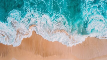 Aerial top view of sandy beach with waves in tropical ocean, minimalism. summer background , copy...