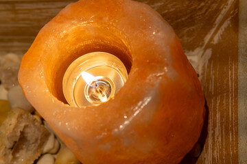 tea light candle in a salt stone