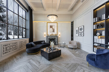 stylish cozy light bright luxurious spacious interior of a country house white walls with ornaments, fireplace, work area and recreation area without people during the day